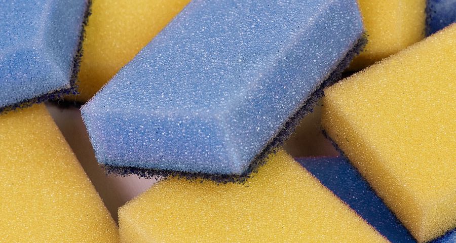 A close up of some yellow and blue sponges