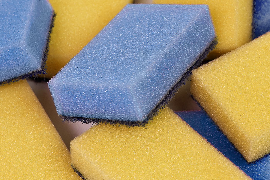 A close up of some yellow and blue sponges